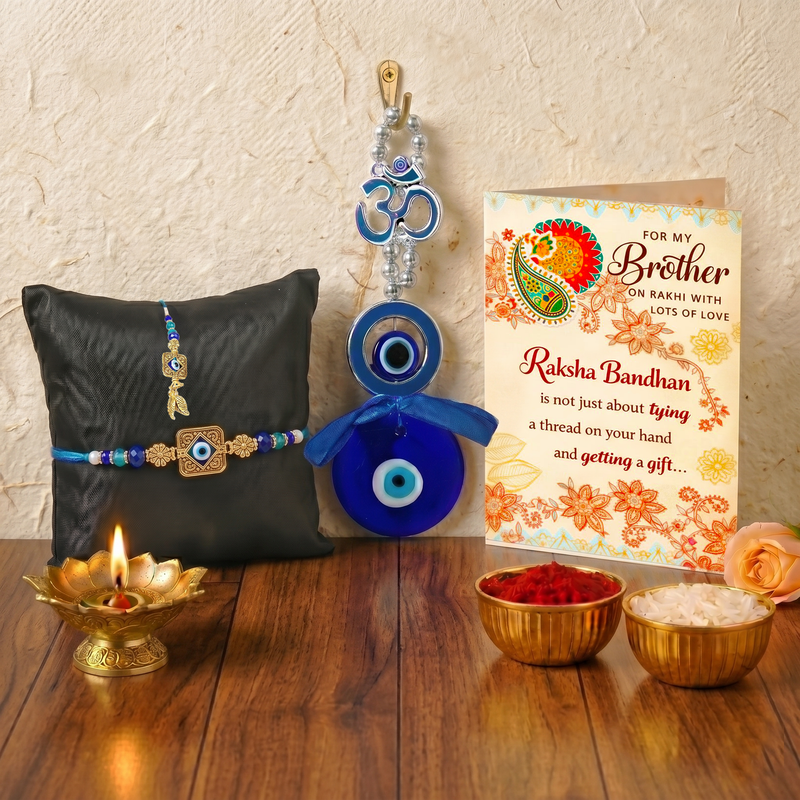 Archies Protective Evil Eye Rakhi Set for Brother and Bhabhi with Special Archies Greeting Card + Evil Eye Lumba Bracelet + Evil Eye Wall Hanging for Nazar Protection - Rakhi Hamper for Bhaiya Bhabhi, Bhabhi, Sister-in-Law