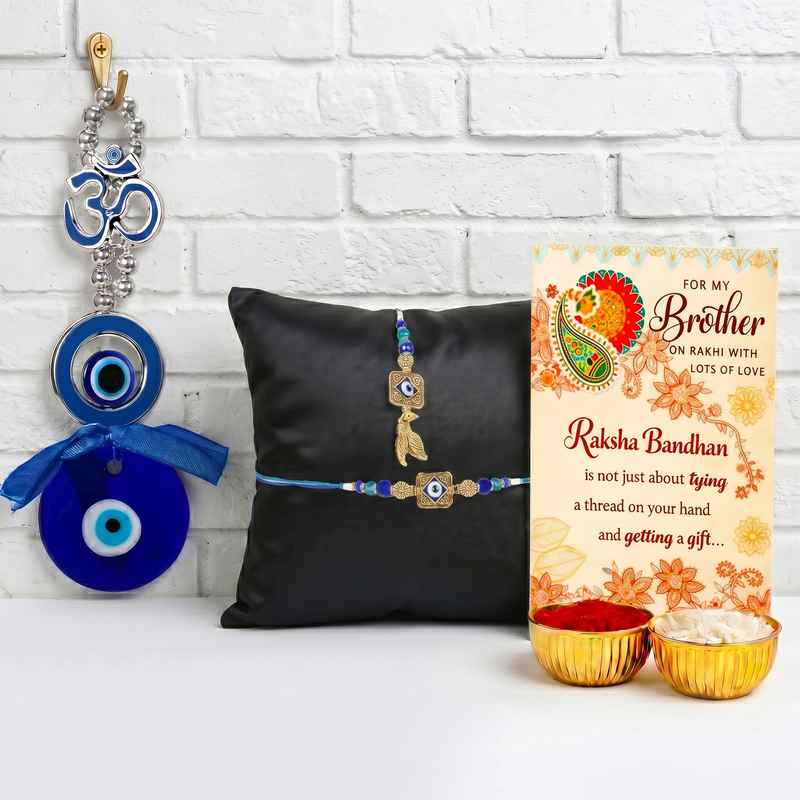 Archies Protective Evil Eye Rakhi Set for Brother and Bhabhi with Special Archies Greeting Card + Evil Eye Lumba Bracelet + Evil Eye Wall Hanging for Nazar Protection - Rakhi Hamper for Bhaiya Bhabhi, Bhabhi, Sister-in-Law